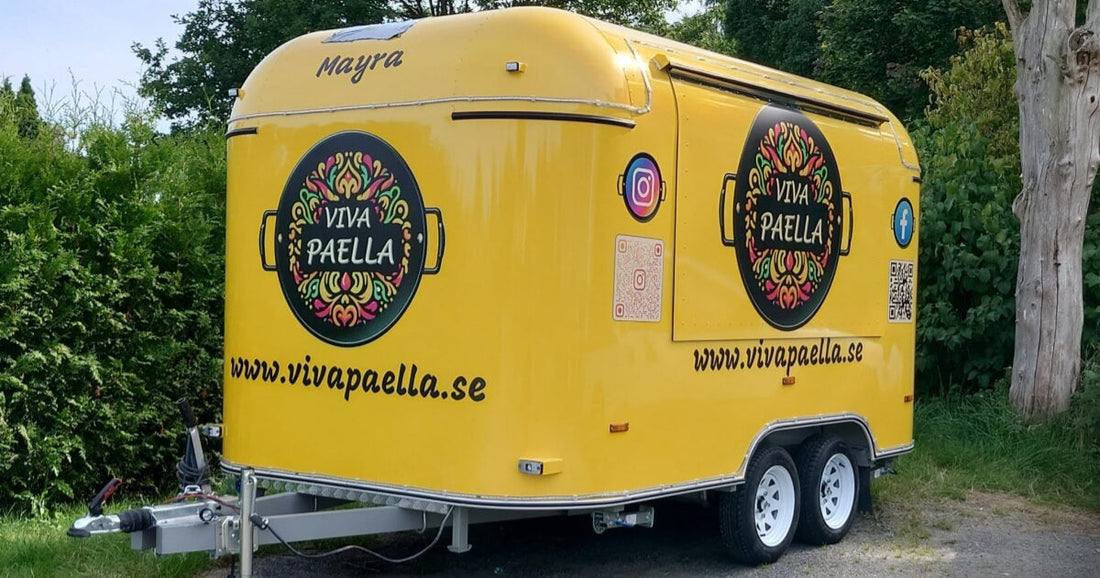 Custom airstream-style food trailer for sale with full yellow vinyl wrap – Isabella Trailer