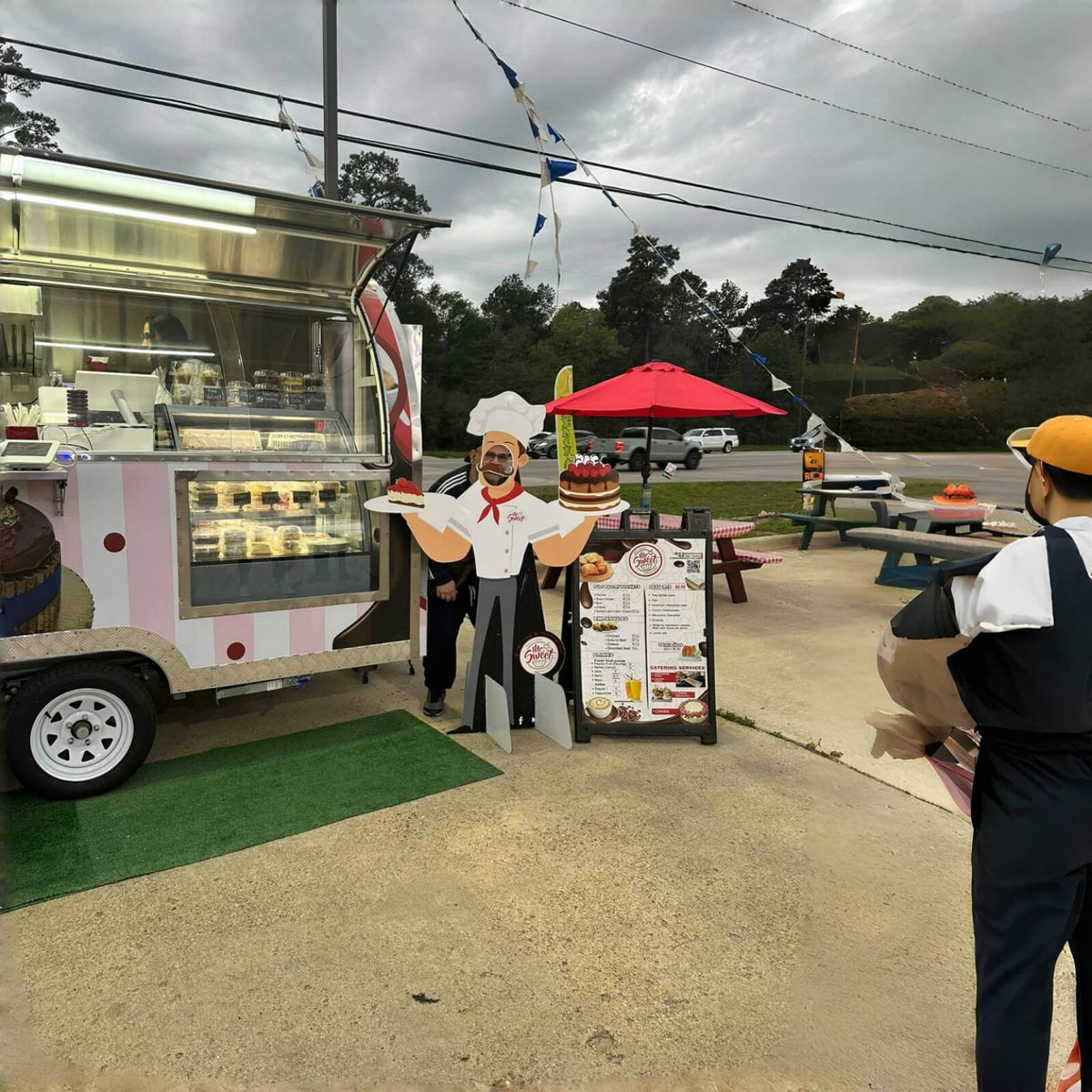 Bakery trailer with refrigerated cake display case for pastries and dessert products