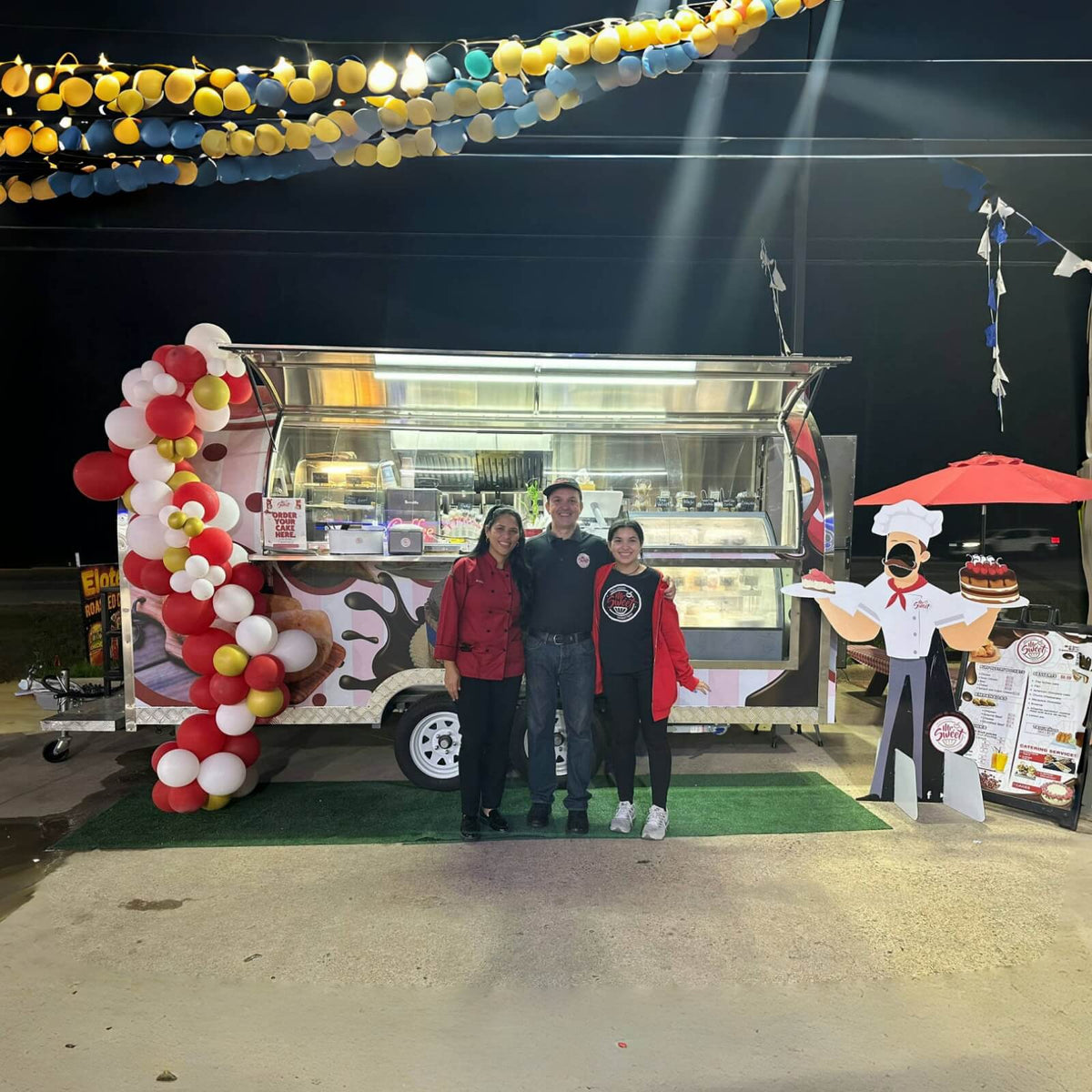 Bakery trailer in real operation with customers, cake display cabinet, menu board, and branded exterior