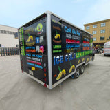 Rear view of a beverage trailer showing closed service windows and a clean exterior design for mobile drink operations