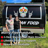 Customer standing beside a black rounded Mexican food trailer with Sugar Skull custom wrap design
