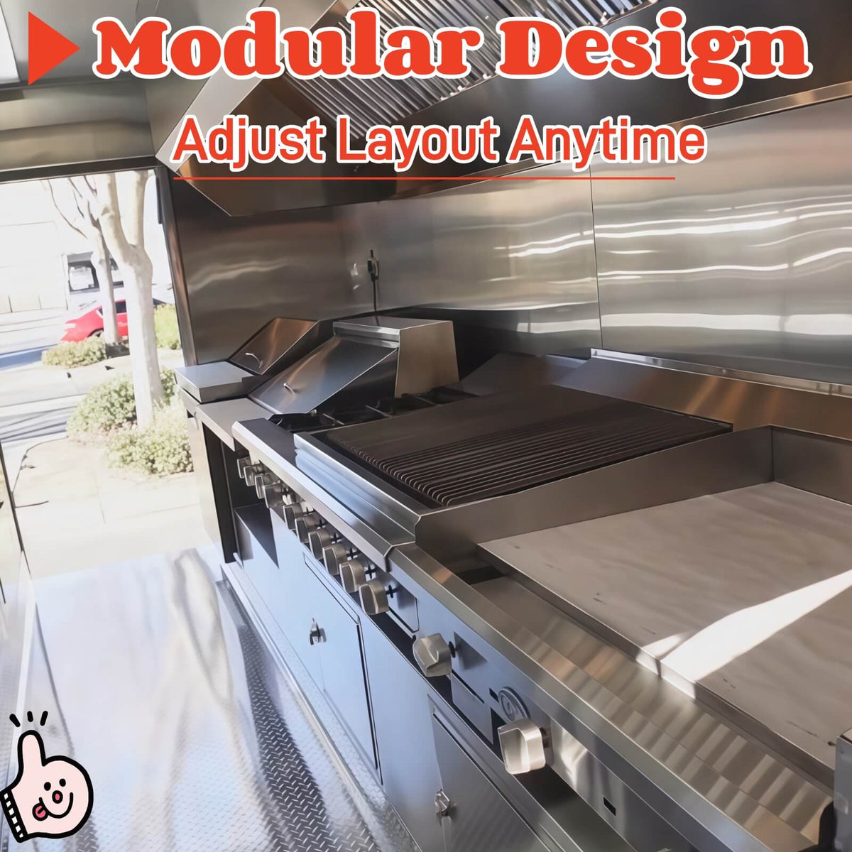 Interior view of a commercial food trailer featuring stainless steel walls, a commercial exhaust hood, large grill and griddle equipment, under-counter storage cabinets, and anti-slip flooring.