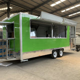 Green concession trailer for sale full side view with serving windows and awning open – custom food trailer with full kitchen inside