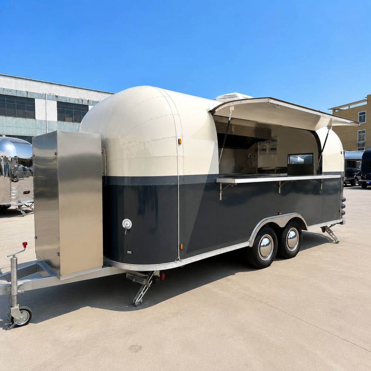 Custom Airstream food trailer rear view – dark grey cream exhaust chimney dual axle by Isabella Trailer