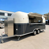 Custom Airstream food trailer rear view – dark grey cream exhaust chimney dual axle by Isabella Trailer