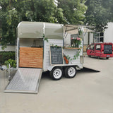 Custom beverage horse trailer for sale – white rustic wood panel bar setup with ramp by Isabella Trailer