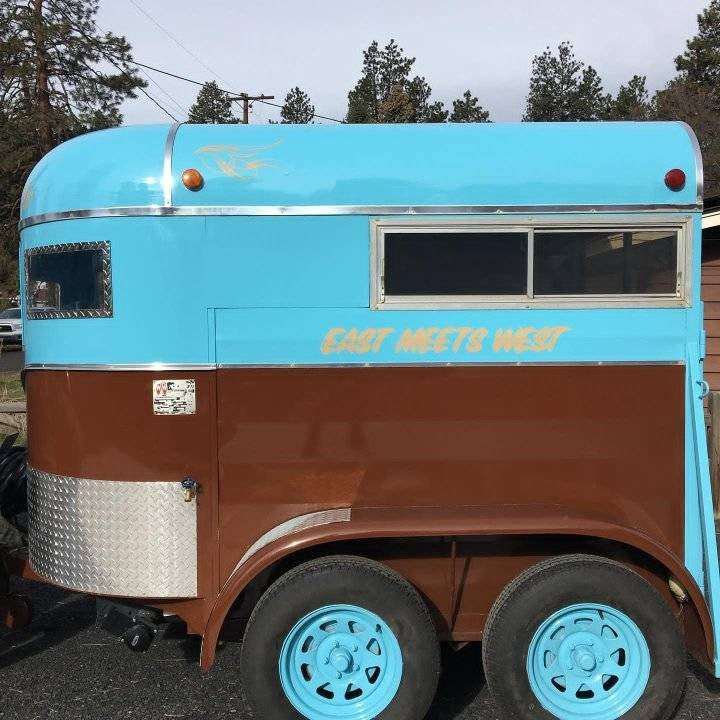 Custom horse trailer mobile kitchen side view – East Meets West branding dual axle
