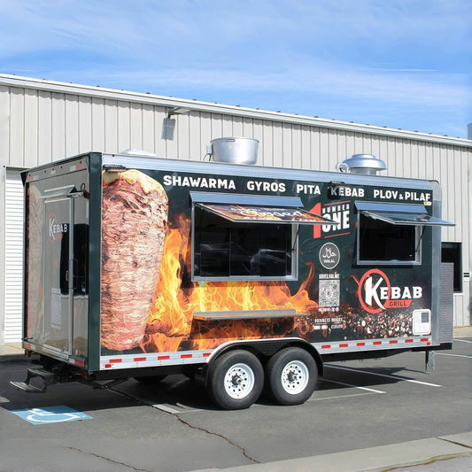 Side exterior view of a custom kebab and shawarma food trailer with a full-body graphic wrap, dual service windows, and a heavy-duty dual axle chassis.