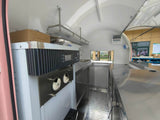 Custom pink rounded crepe trailer interior – dual crepe machine stainless steel kitchen exhaust hood by Isabella Trailer