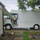 White step van Mexican food truck front side view with driver door open – customizable mobile catering truck for sale