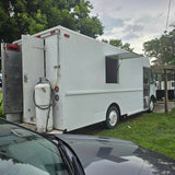 White step van Mexican food truck rear view with LP gas tank and serving window – fully equipped mobile catering truck for sale
