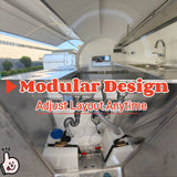 Interior view of a rounded coffee trailer featuring a stainless steel workbench, sink area, and dual fresh and waste water tanks.