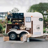 Rustic horse trailer cocktail bar – The Trough chalkboard menu wood panel wedding setup by Isabella Trailer