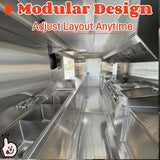 Small concession trailer interior featuring stainless steel walls, three compartment sink, commercial exhaust hood, and custom food service equipment layout.