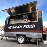 8ft rounded Mexican food trailer with custom Sugar Skull wrap