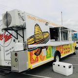 Mexican-themed taco food truck with colorful sombrero wrap, open serving window and tacos burritos menu – custom mobile catering truck for sale